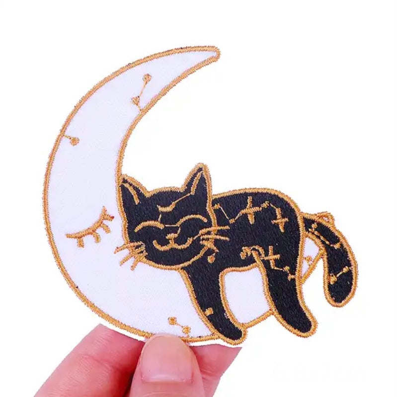 Funny embroidered iron-on patch with a cute kitty sleeping peacefully on the Moon :) A perfect way to bring new life to your old garments or to cover small holes or marks with this cute kitty!