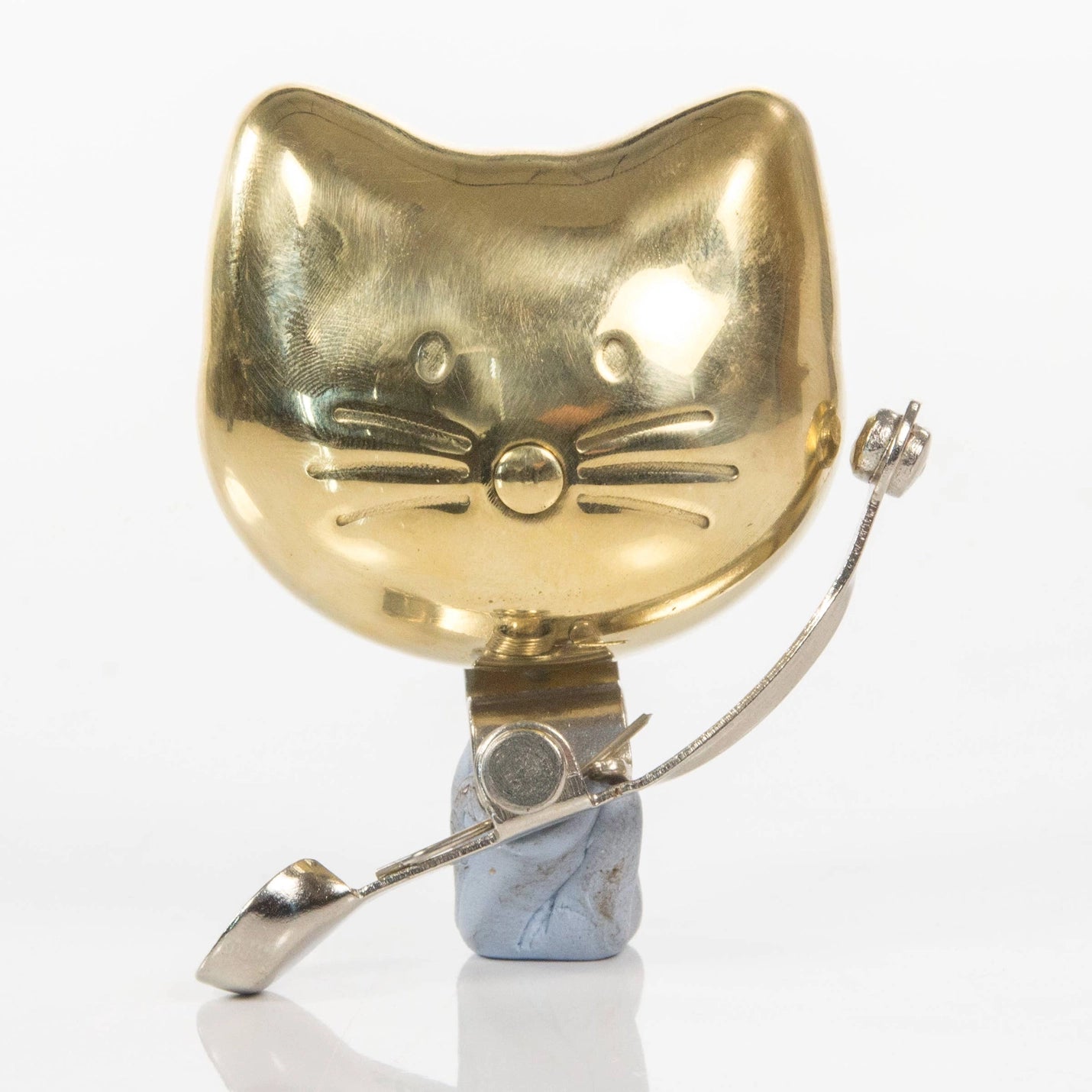 Simple yet effective, the Cat Bicycle Bell uses centuries old, trusted technology to warn people out of your way: a compact brass bell with a sprung thumb lever. Stay safe while riding by installing this golden kitty shaped bell to your bicycles, or scooters! Warn other road users and avoid cat-astrophe. Perfect for a cat-loving outdoor cyclist, it's a unique product full of cattitude.