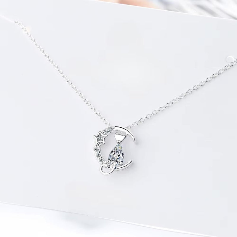 cat and moon pendant with crystals white background