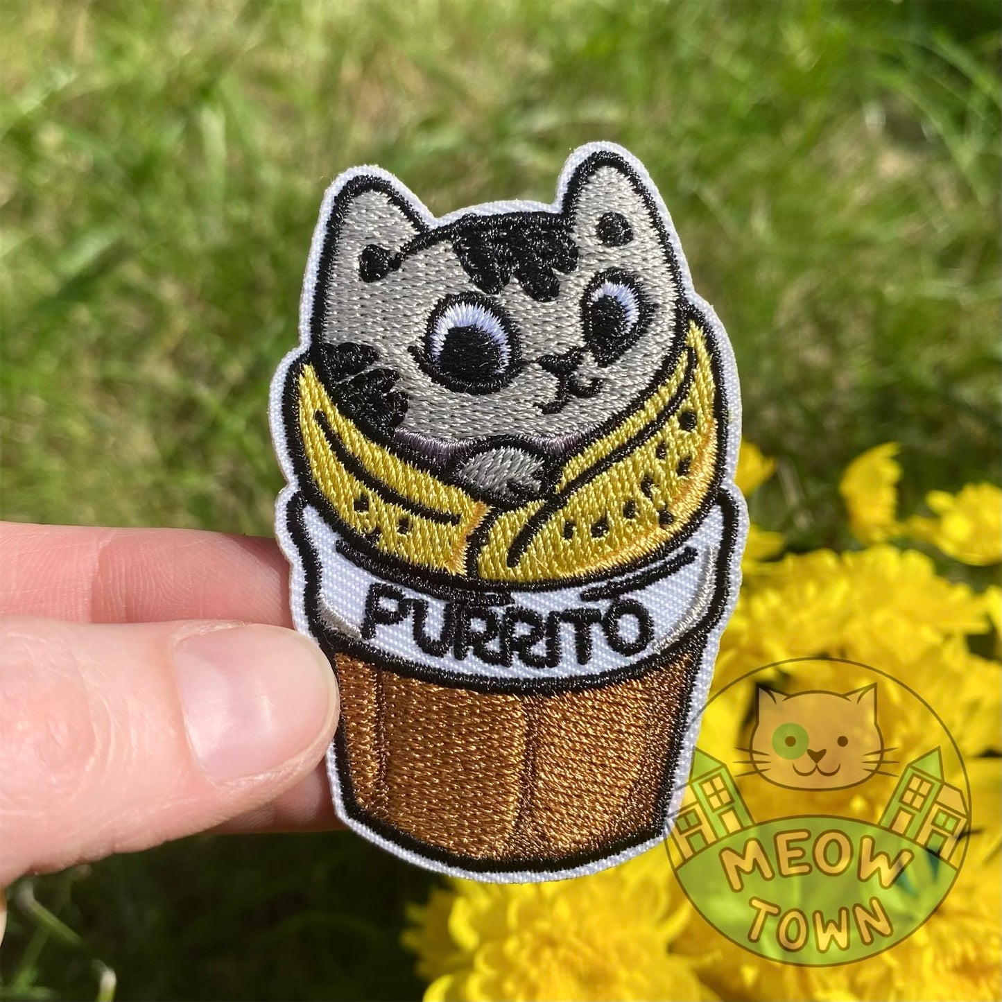 Adorable embroidered iron-on purrito cat patch. A perfect way to bring new life to your old garments or to cover small holes or marks with this cute kitty!