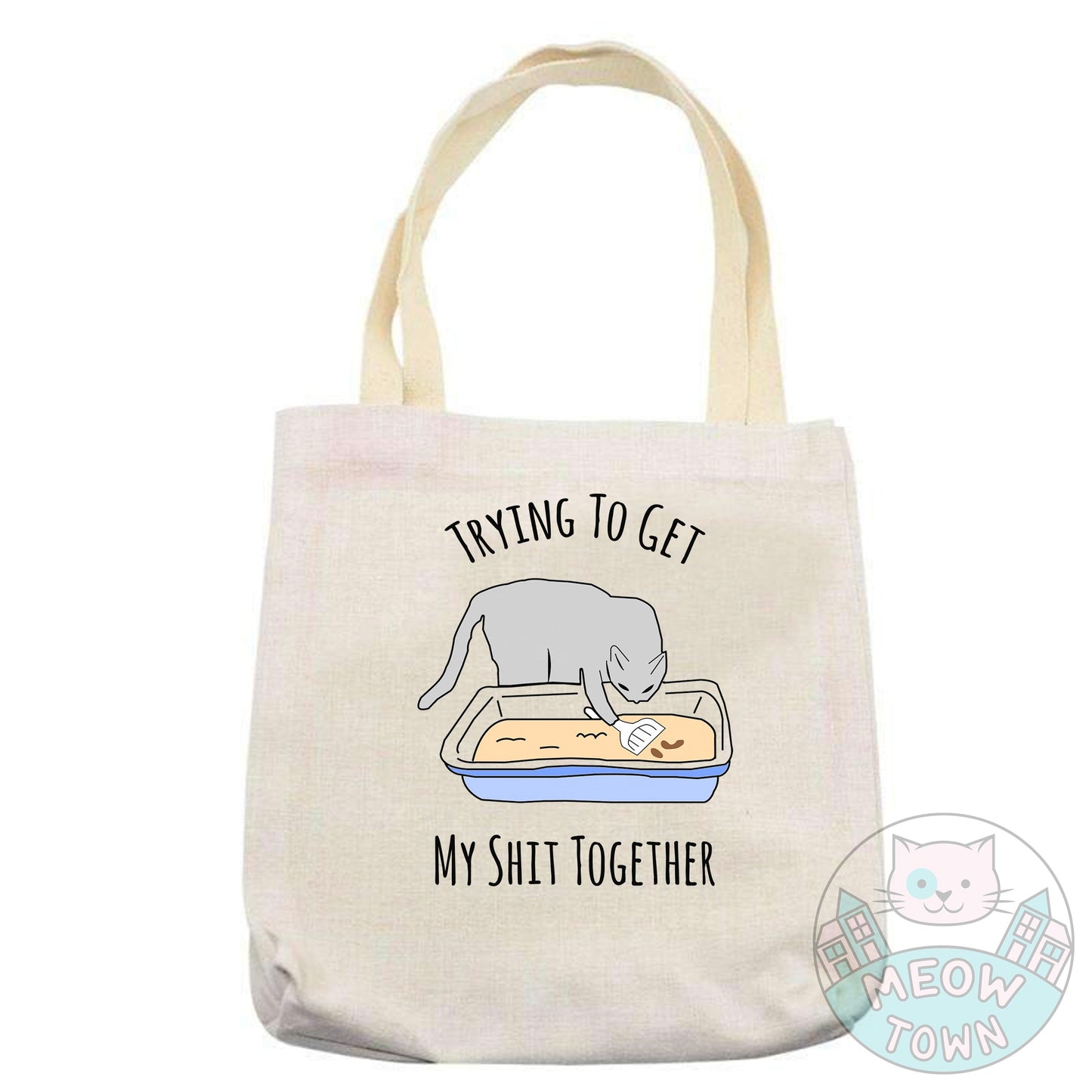 Super cute yet handy tote bag printed in the UK by us at Meow Town exclusively for You. Funny 'Trying to get my shit together’ quote with a kitty cleaning his own litter tray :) Natural beige colour. Durable single layer material. Polyester and cotton fabric, linen effect. Choose from 3 bag types: Classic tote, Large tote or drawstring backpack.