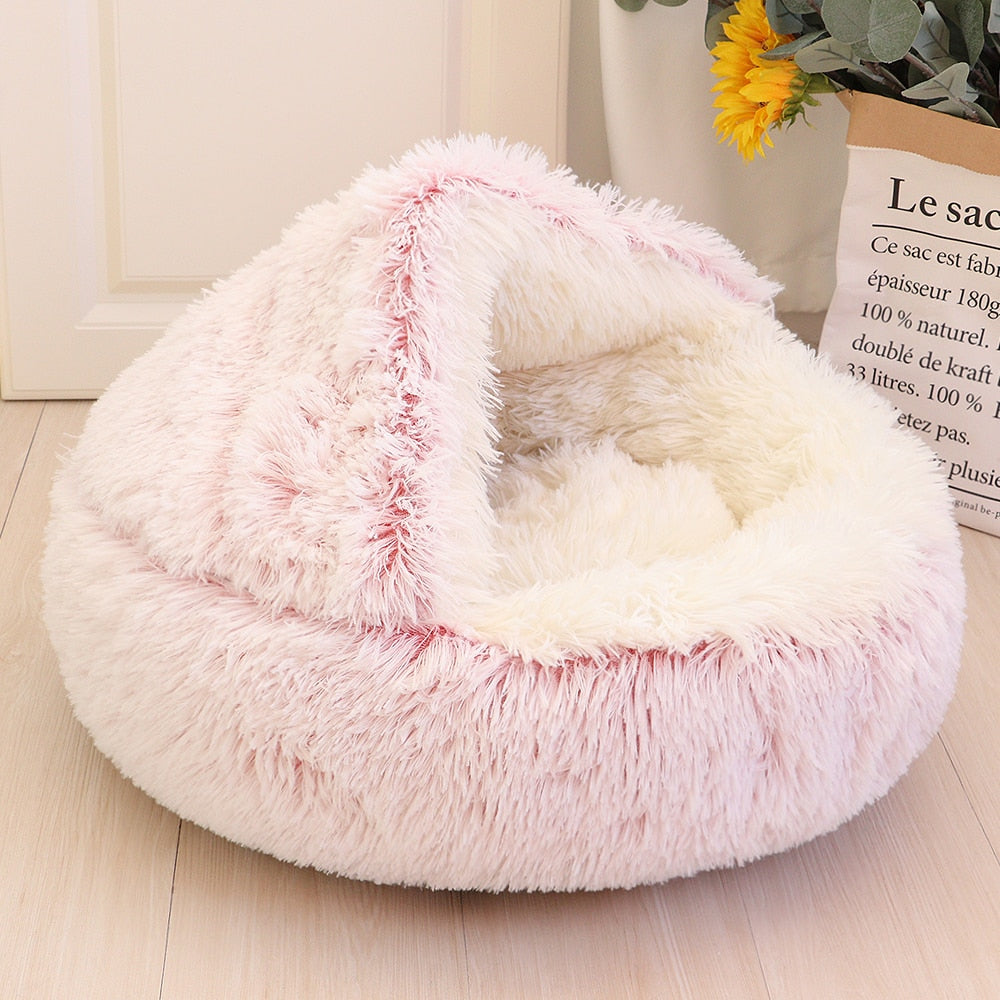 All cats need their own little spaces to hide from time to time. This cosy fluffy bed is a purrfect gift for your furry friend. Super soft and warm. Non-slip bottom. Large size, perfectly enough room for kittens and adult cats as well. Material: Polyester and cotton, long pile plush.