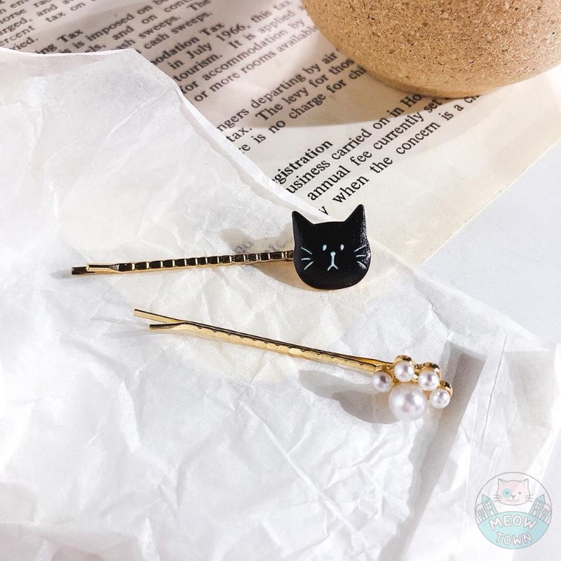 Here is a super cute cat hairpins set of 2, with a cat and pearl paw design