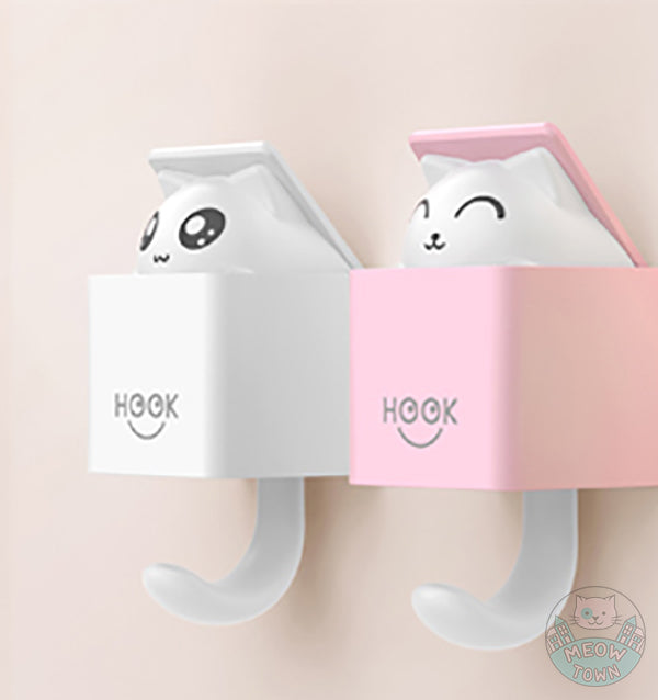 A super fun, cute cat hook available in two colours Two positions - Closed when the hook is empty, the cute cat appears as soon as the hook is in use