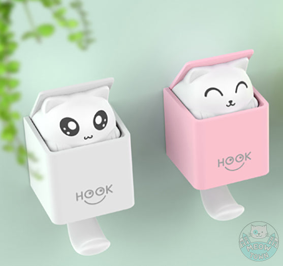 A super fun, cute cat hook available in two colours Two positions - Closed when the hook is empty, the cute cat appears as soon as the hook is in use
