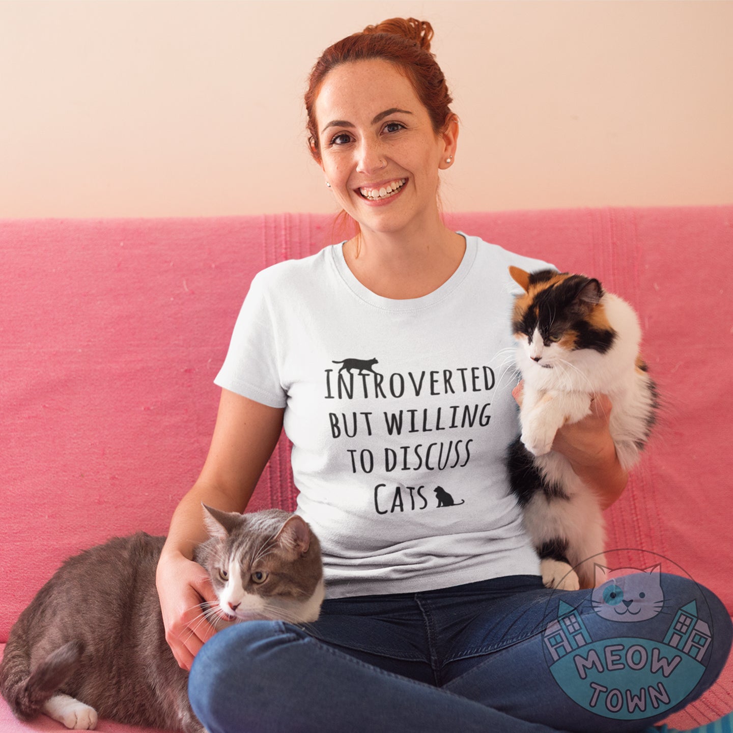Classic unisex cotton T-shirt with funny 'Intorverted but willing to discuss cats' slogan.  Meow Town Special design, you won't find it on the high street! Printed exclusively for You in the UK by us. Classic unisex tee true to size. Perfect gift for cat lovers.