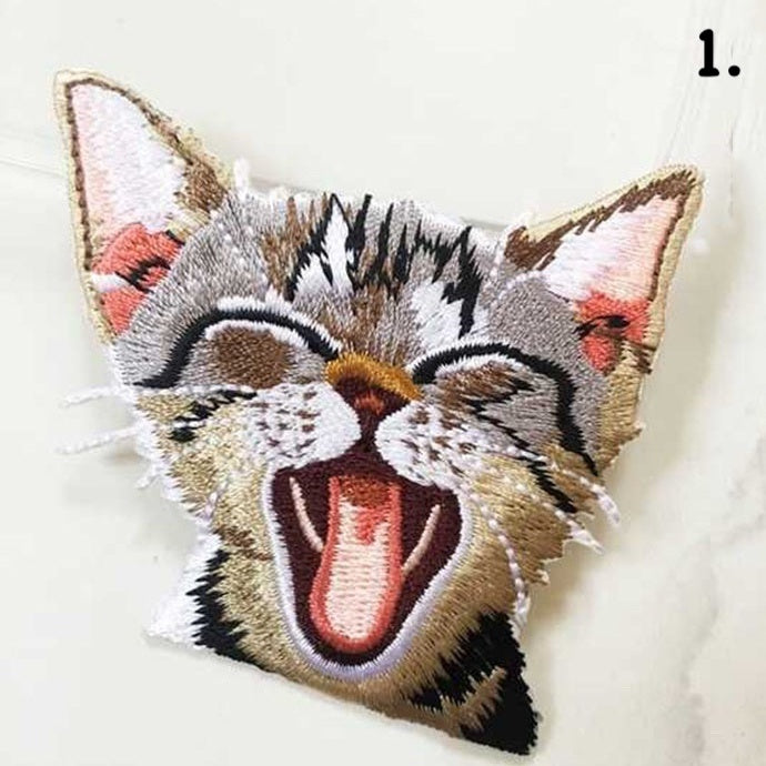 Adorable embroidered iron-on kitty patches in various designs. A perfect way to bring new life to your old garments or cover small holes or marks with these cute kittens! Please choose required design from the drop-down menu. Glue is already applied to the back of the design, you can simply iron these patches on to the fabric
