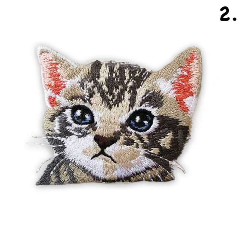 Adorable embroidered iron-on kitty patches in various designs. A perfect way to bring new life to your old garments or cover small holes or marks with these cute kittens! Please choose required design from the drop-down menu. Glue is already applied to the back of the design, you can simply iron these patches on to the fabric