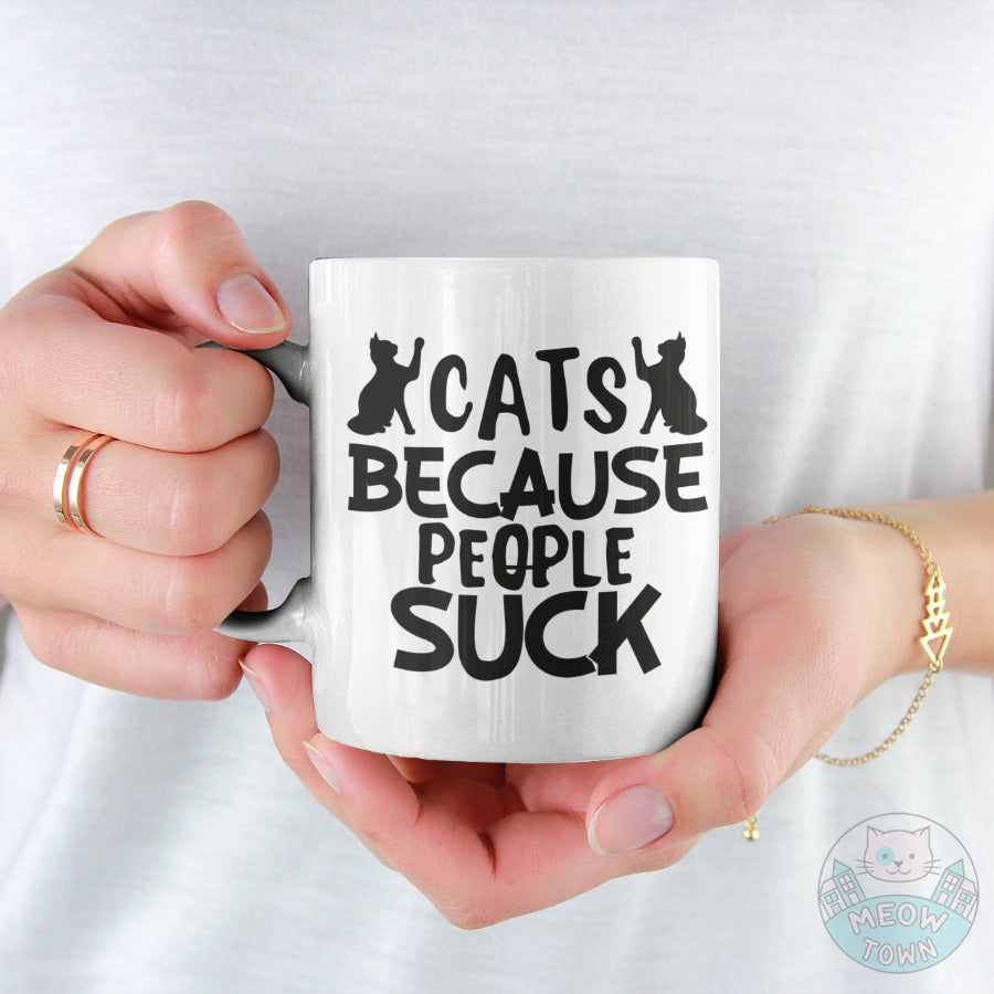 Funny Meow Town Special Print exclusively for cat people, who simply prefers the company of cats more than people :) Because: people suck! Made by us in the UK, production time is 1 working day. White ceramic material.