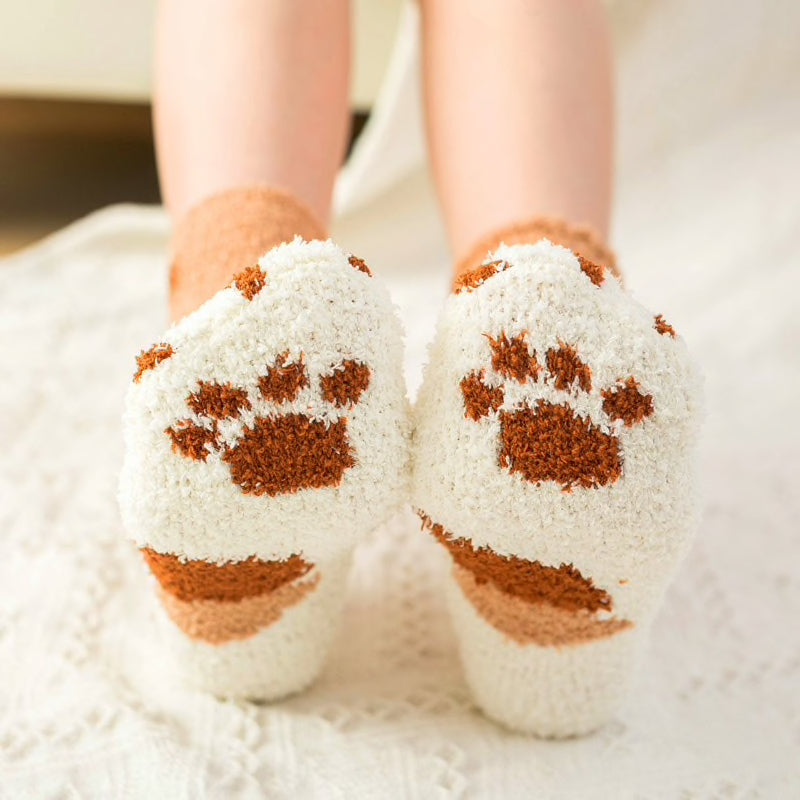 A pair of lovely, warm socks to match your footsies to your little furry friend's paws. Soft and very comfy. One size ginger tabby orange pattern