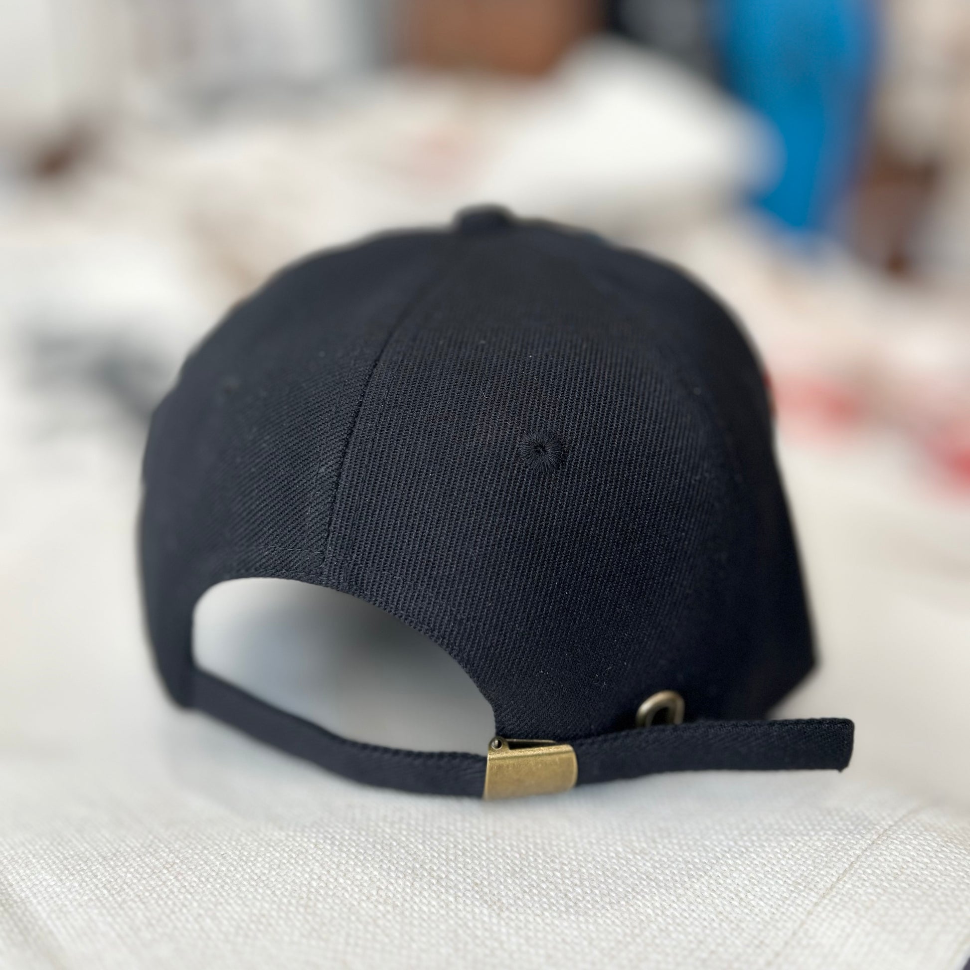 baseball cap with “Tell your cat I said pspsps.. “ embroidered