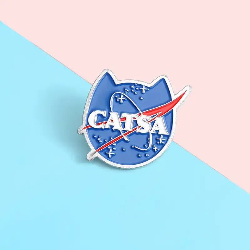 Funny NASA style ‘CATSA’ kitty shaped enamel pin badge.