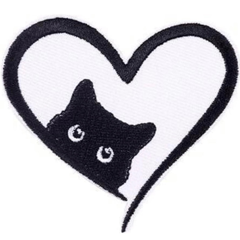 Adorable embroidered iron-on patch with a black kitty in a heart. A perfect way to bring new life to your old garments or to cover small holes or marks with this cute kitty!
