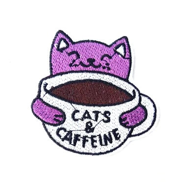 Adorable embroidered iron-on patch with a cute purple kitty and cats & caffeine slogan. A perfect way to bring new life to your old garments or to cover small holes or marks with this cute kitty!