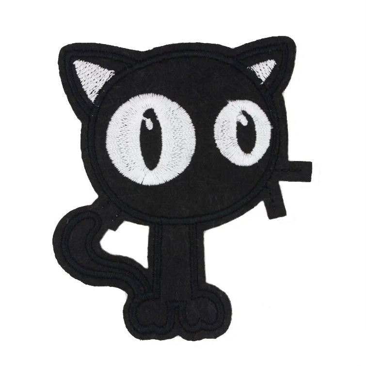 Adorable embroidered iron-on patch with a cute cartoon style black kitty. A perfect way to bring new life to your old garments or to cover small holes or marks with this cute cat!