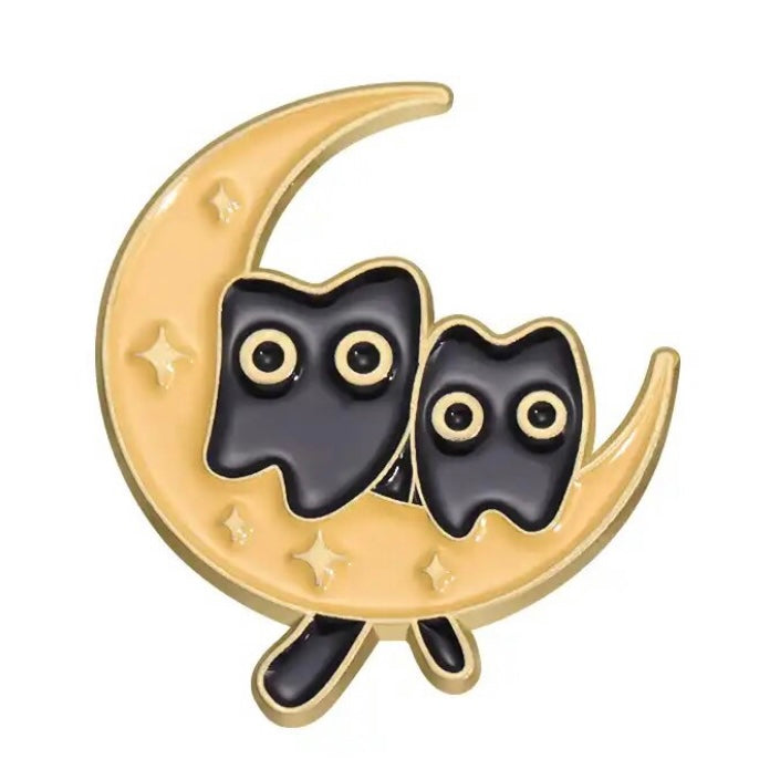 A lovely enamel pin badge with two black kitties on the Moon. Perfect little present for cat lovers or great stocking filler / cheer me up gift.