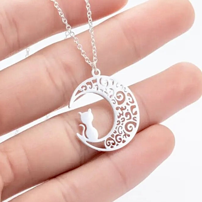 A beautiful stainless steel necklace with a cute kitty sitting on the moon. Silver colour.