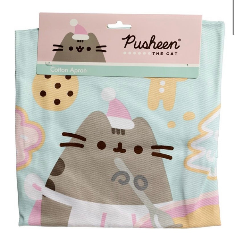 Lovely Pusheen the Cat festive edition apron – a purrfect blend of festive cheer and culinary charm!  Crafted with high-quality 100% cotton material. The adjustable waist straps ensure a comfortable fit for all aspiring chefs and baking enthusiasts. Let Pusheen accompany you in the kitchen this holiday season