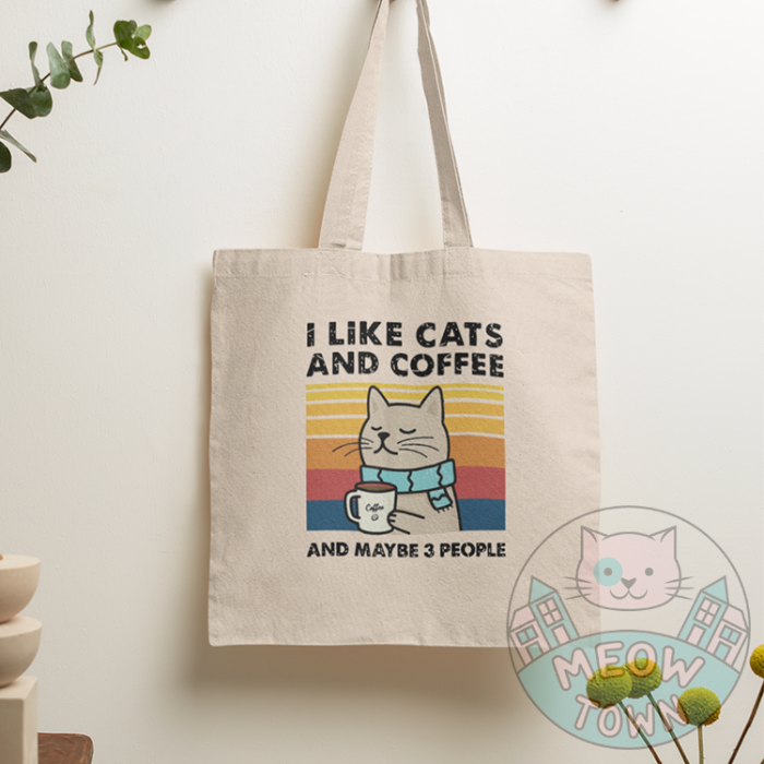 I Like Cats And Coffee and maybe 3 people funny Tote Bag hanging on wall natural canvas