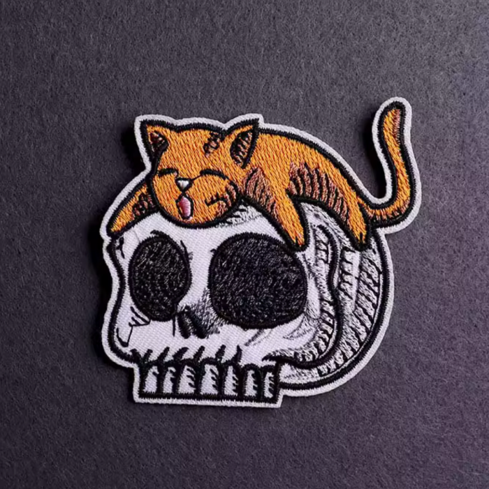 iron-on cat on skull patch