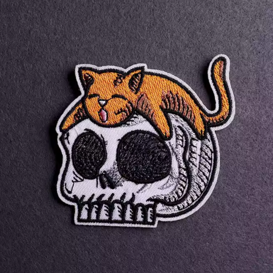 iron-on cat on skull patch