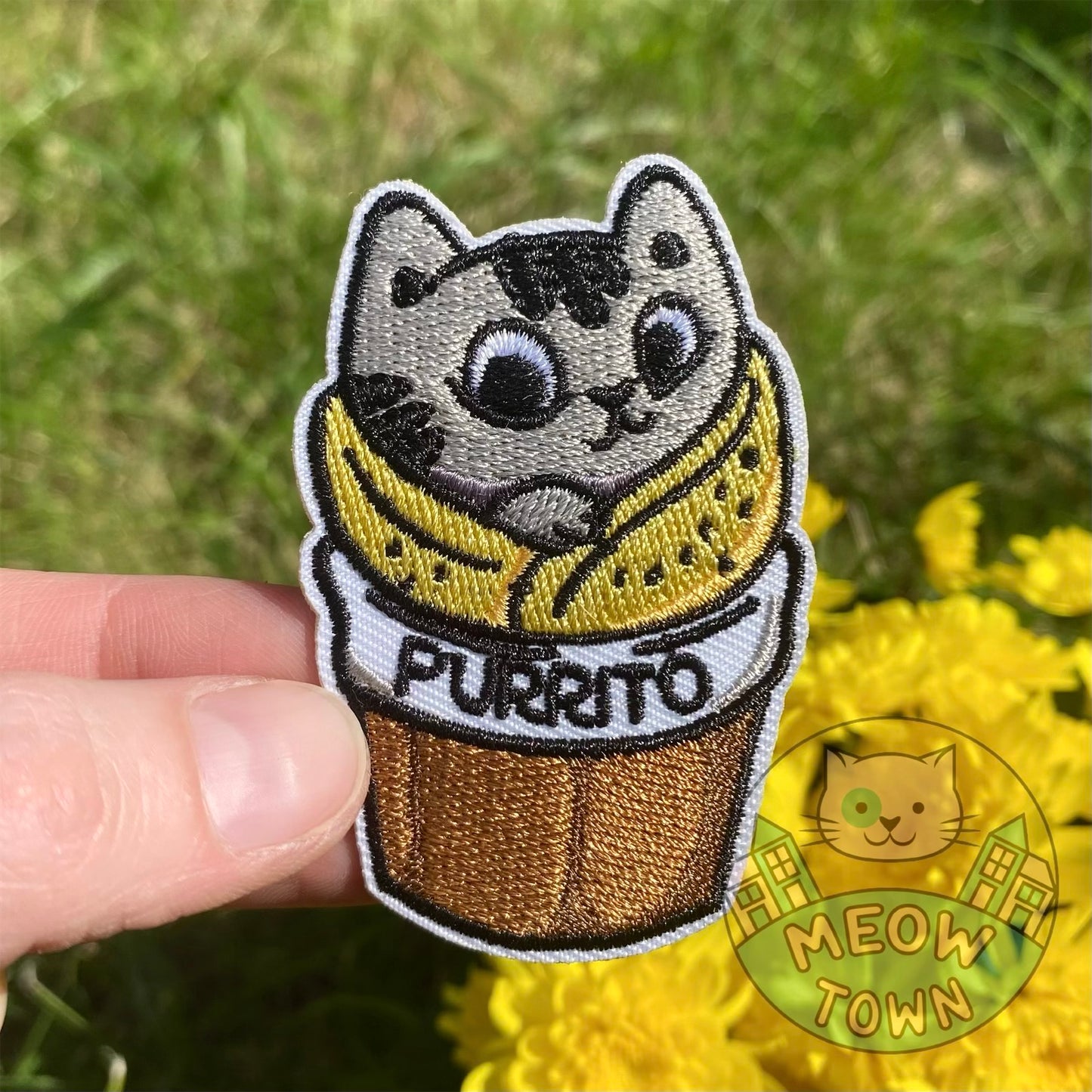 Adorable embroidered iron-on purrito cat patch. A perfect way to bring new life to your old garments or to cover small holes or marks with this cute kitty!