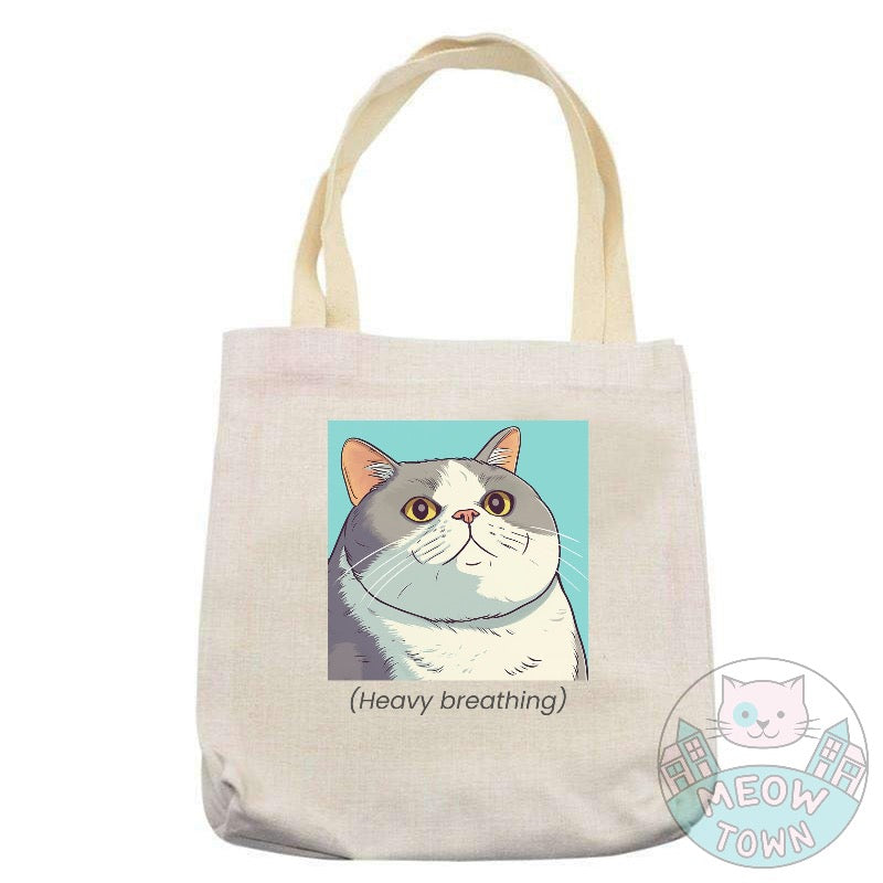 A lovely beige, durable classic tote bag printed in-house by us, exclusively for You. Funny 'Heavy breathing' slogan and kitty illustration. Polyester and cotton fabric, linen effect. Choose from 2 bag types: Classic tote, Large tote.