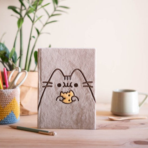 pusheen plush A5 notebook standing on table