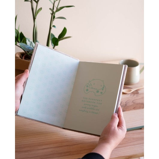 pusheen plush A5 notebook open in hands
