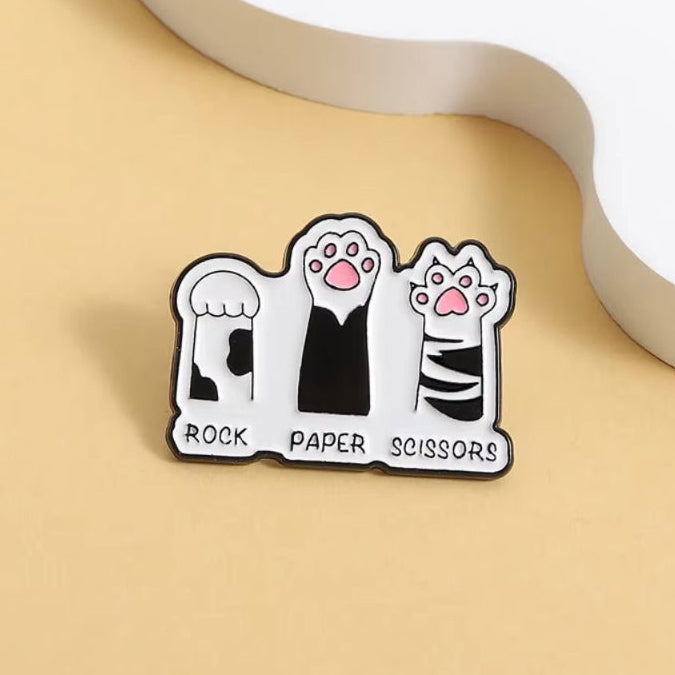 rock paper scissors paw pin badge