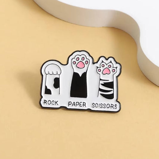 rock paper scissors paw pin badge