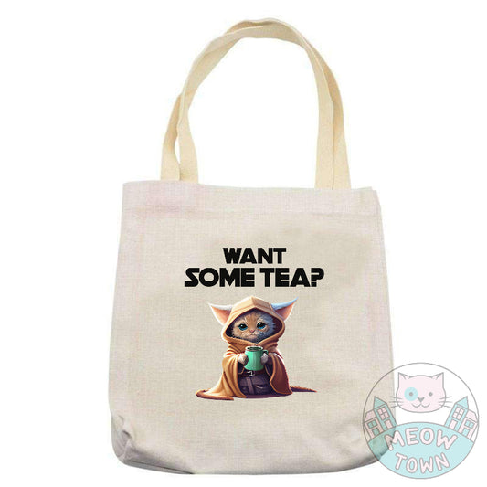 The print features a lovely kitty holding a cup of tea with ’Want some tea?' slogan. yoda cat tote bag for cat people