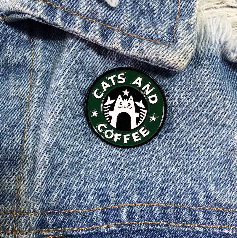 A lovely enamel pin badge for people who only need Cats & Coffee for happiness <3 Dimensions: 3cm diameter. Material: Enamel, zinc alloy. It can be a purrrfect stocking filler for your friends and family.