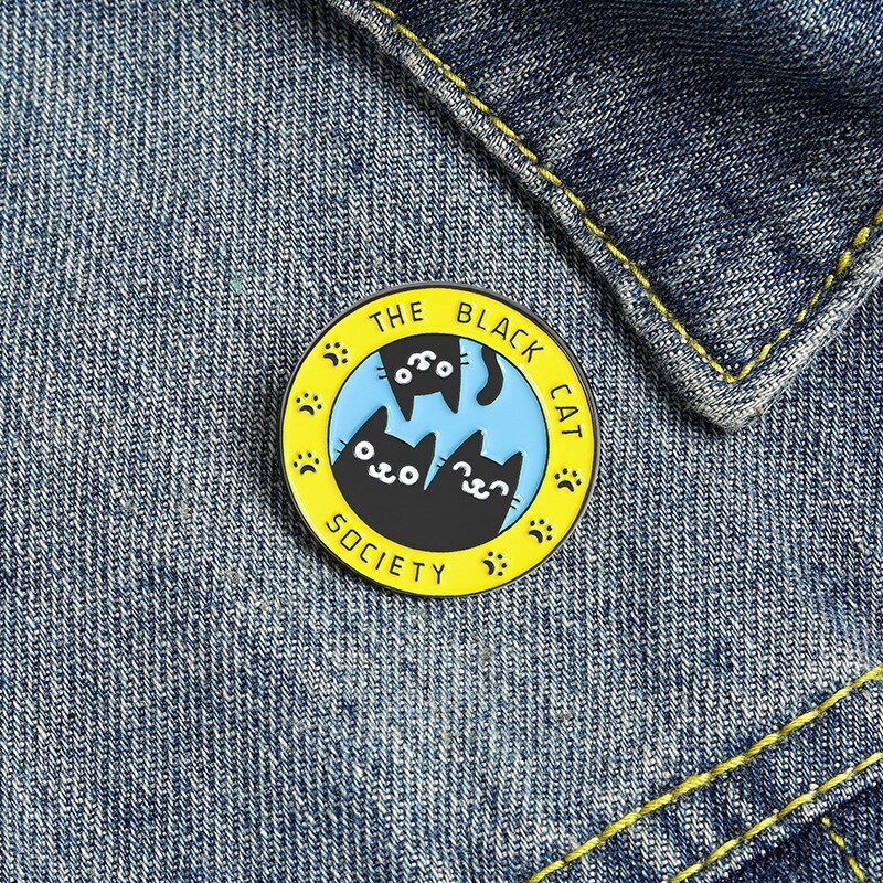 A lovely enamel pin badge for black cat lovers. Black cat society. It can be a purrrfect stocking filler for your friends and family.