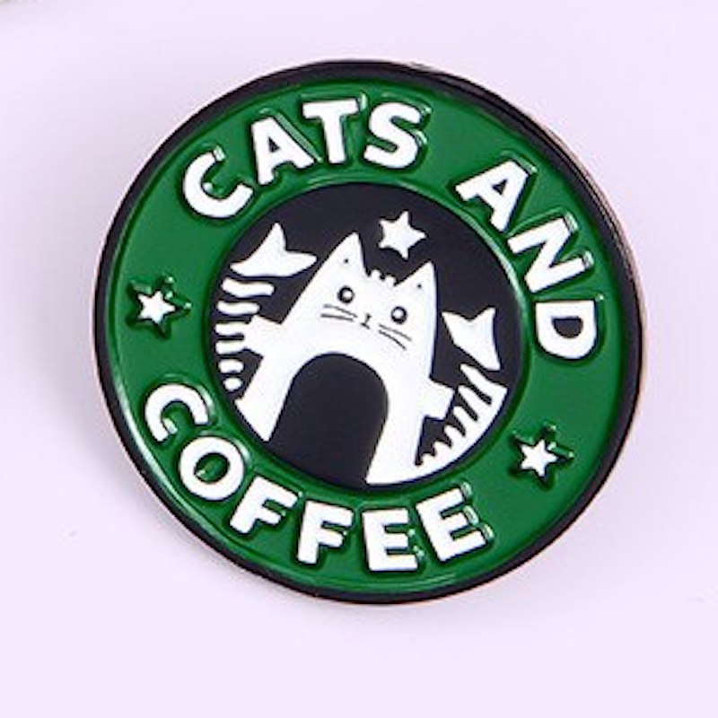 A lovely enamel pin badge for people who only need Cats & Coffee for happiness <3 Dimensions: 3cm diameter. Material: Enamel, zinc alloy. It can be a purrrfect stocking filler for your friends and family.