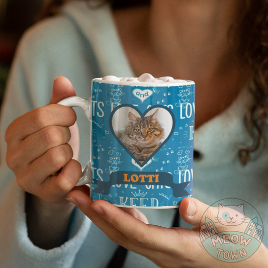 Sip your favourite hot drink from this stylish coffee mug printed with your favourite furball(s).  Keep calm and love cats background. Custom cat photo in cute heart with name underneath. The best unique present you can buy for a cat mum / dad!