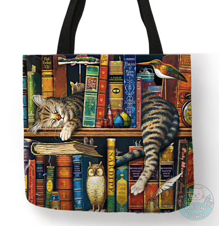 cat sleeping on bookshelf tote bag linen for cat lovers