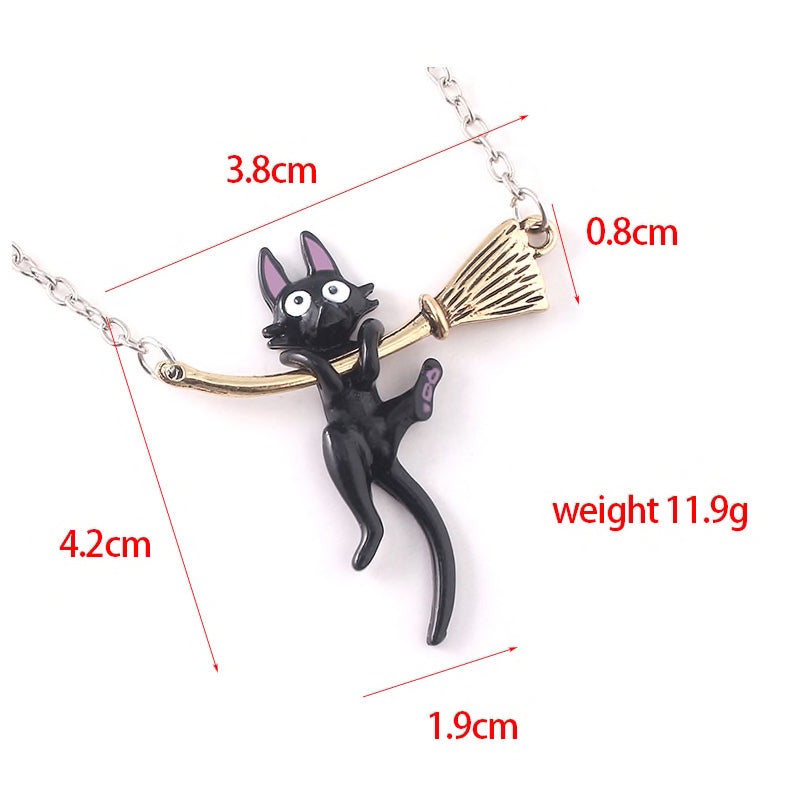black kitty hanging on the golden broom pendant on chain for cat kitten lovers
