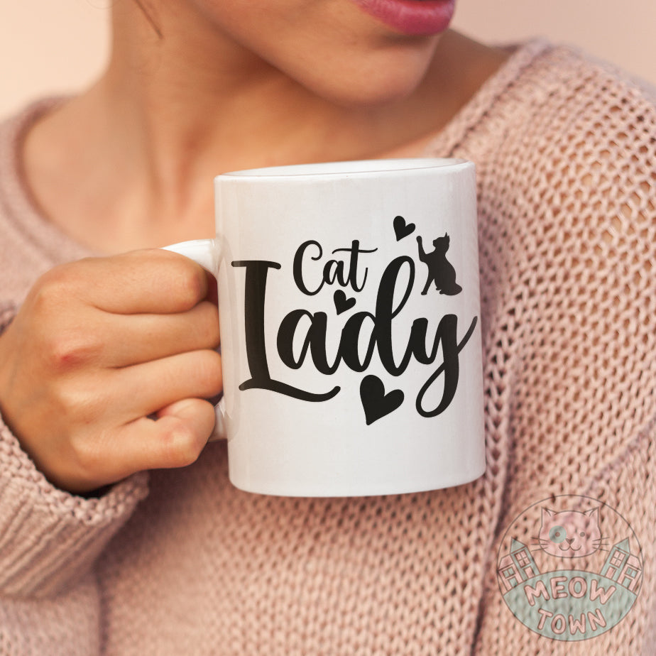 Cute Meow Town Special printed mug, exclusively for Cat Ladies. No kitchen is complete with a couple of stylish feline themed mugs. Ceramic mug perfect gift idea for crazy cat lovers.