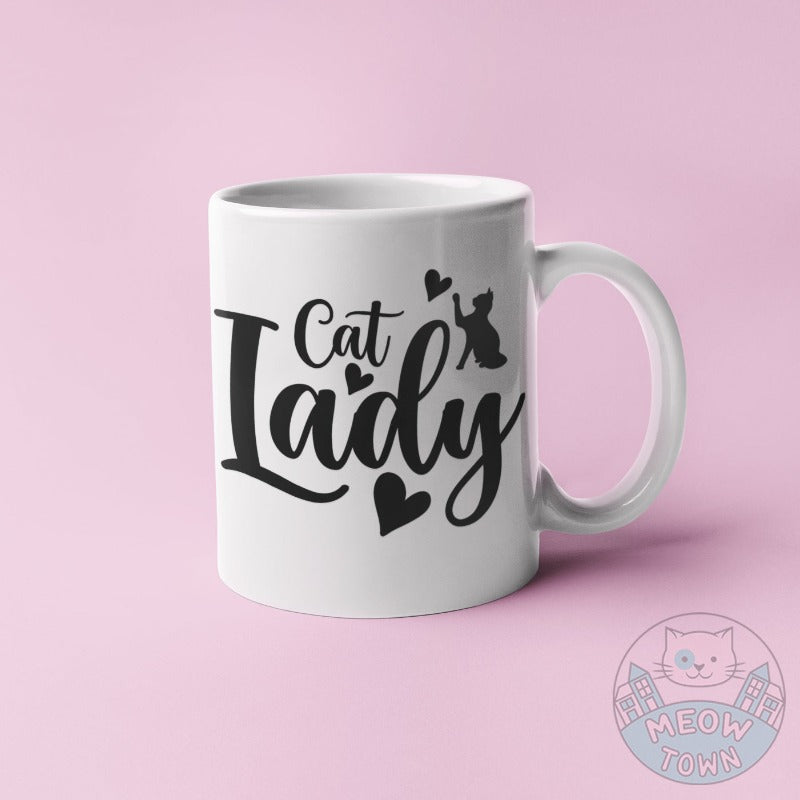 Cute Meow Town Special printed mug, exclusively for Cat Ladies. No kitchen is complete with a couple of stylish feline themed mugs. Ceramic mug perfect gift idea for crazy cat lovers.