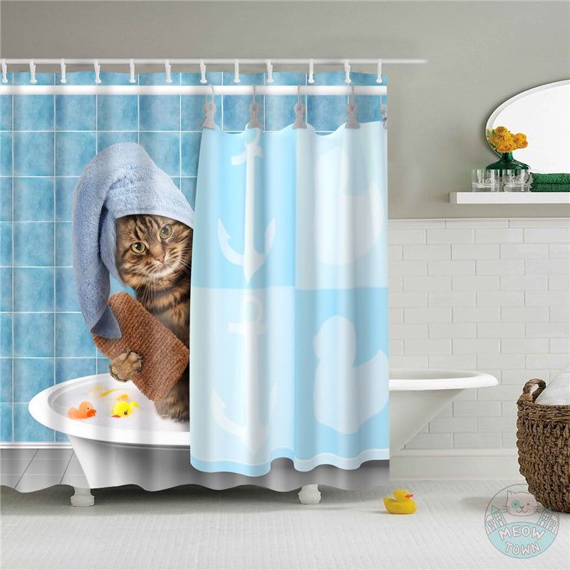 funny cat shower curtain - blue cat in towel bathing rubber ducks looking behind curtain