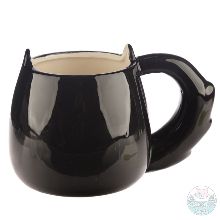 Enjoy your favourite drink from this lovely cat shaped porcelain mug  Black and white colour, fluffy tail and cute cat face with heart shaped nose back