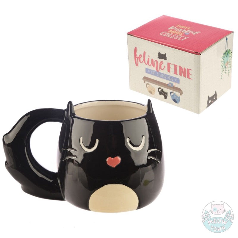 Enjoy your favourite drink from this lovely cat shaped porcelain mug  Black and white colour, fluffy tail and cute cat face with heart shaped nose