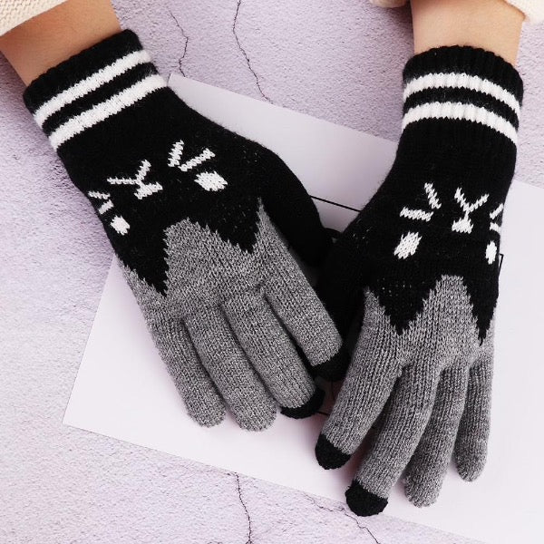Warm, knitted, stretchy gloves with a cute kitty pattern.