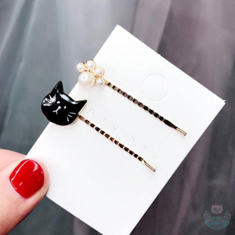 Here is a super cute cat hairpins set of 2, with a cat and pearl paw design