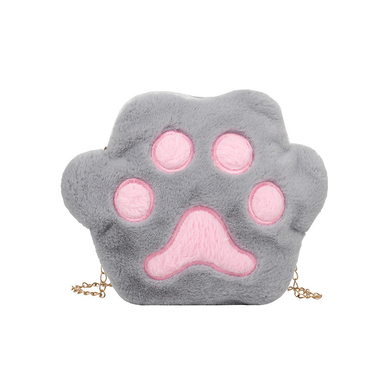 Paw shaped, fluffy crossbody zipped purse. Faux fur (polyester) fabric and gold colour metalware. Suitable for small sized items such as keys, medium sized phone, tissue, coins, makeup.