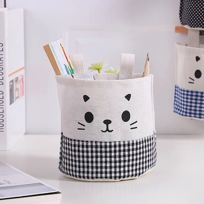 A super cute, small hanging storage bag with adorable printed kitty face to organise your everyday items in your kitchen, diy corner, office and so on.