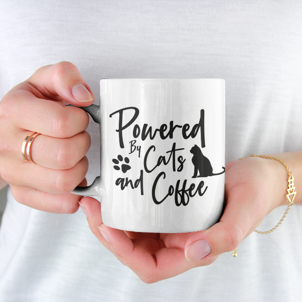 Powered By Cats And Coffee Ceramic Mug