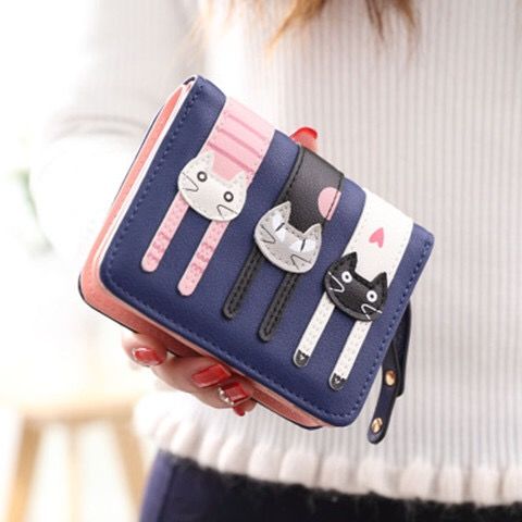 A beautiful and unique small purse with three adorable kitties. Features card holder sleeves and zip-around coin pocket. wallet for cat lovers blue