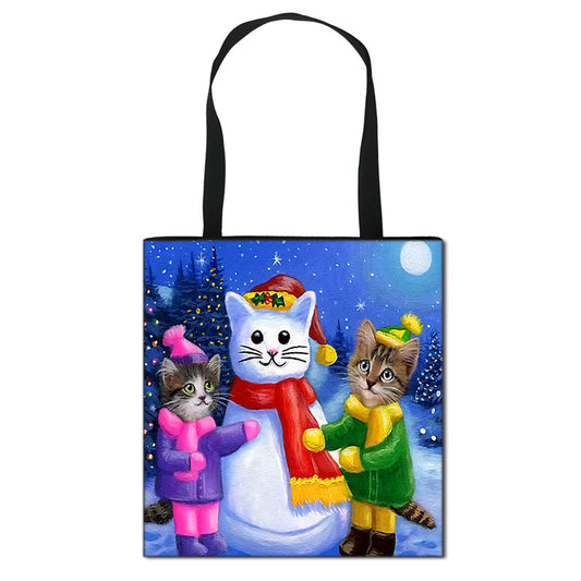 Beautiful festive printed tote bag, with two adorable kittens building a snow-cat :)  Printed